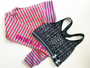 Under Armour pink and gray striped workout pants and a black and white leopard print workout bra