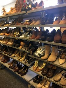 A picture of a large rack of shoes at the Waldorf Goodwill of Greater Washington retail location