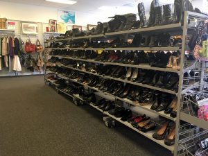 A picture of a large rack of shoes at the Waldorf Goodwill of Greater Washington retail location