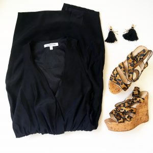 A picture of three items, black, silk, tuxedo-style dress by Elizabeth & James, animal print wedges by Tallulah Blu, and dangle tassel black earrings