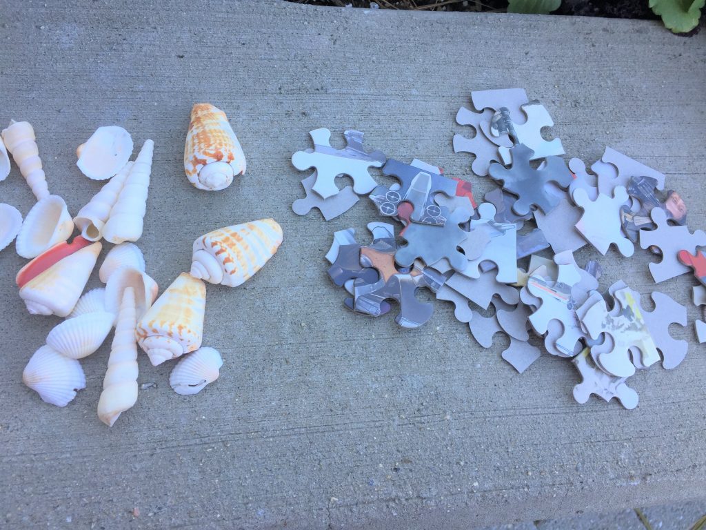 puzzle pieces and shells mirror embellishments 