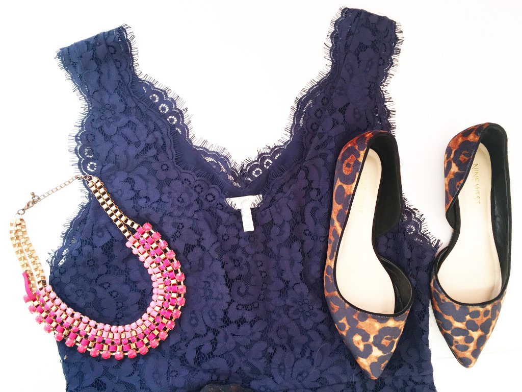 Blue lace dress with pink necklace, and animal print shoes