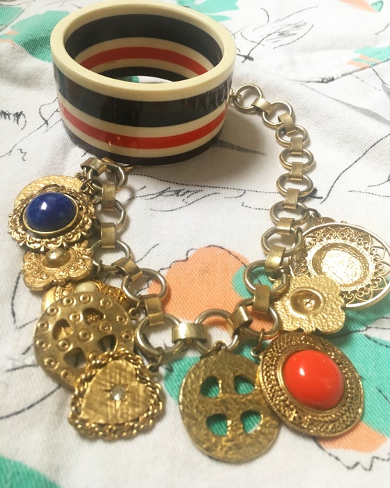 vintage gold necklace and red, white and beige bangle