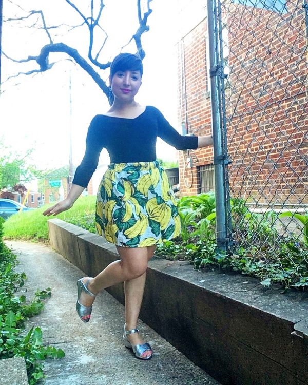 Carolyn strikes a pose in a banana print mini skirt found at the Columbia Pike Goodwill