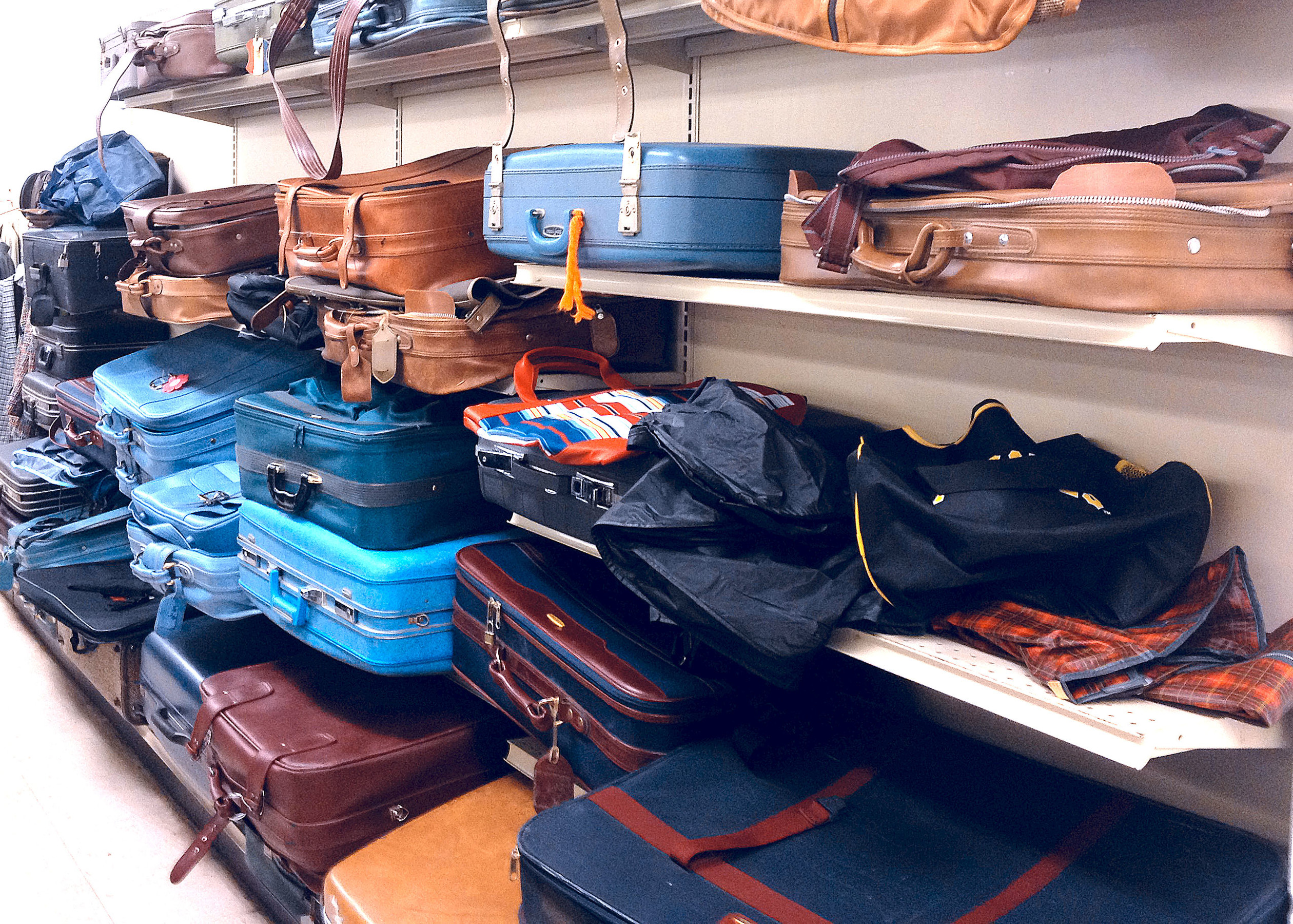 Luggage and bags at Goodwill store