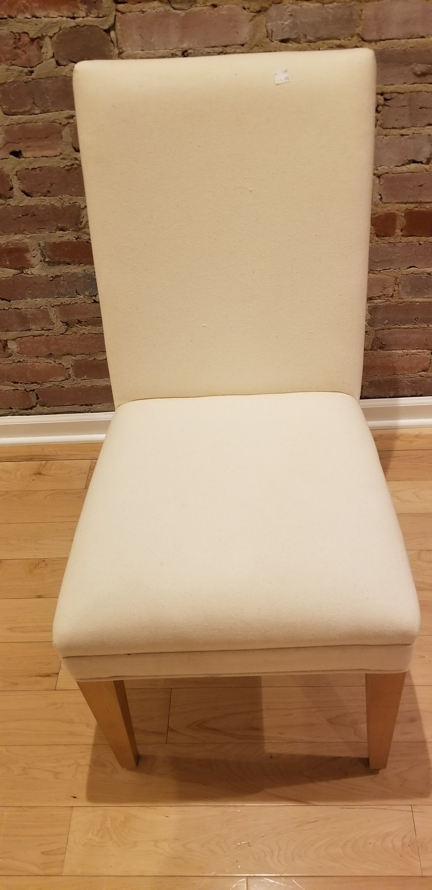 Ariel's Mitchell Gold parson chair found at Goodwill
