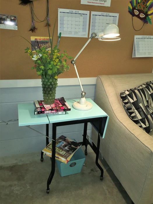 Tim's upcycled typewriter table used as an end table