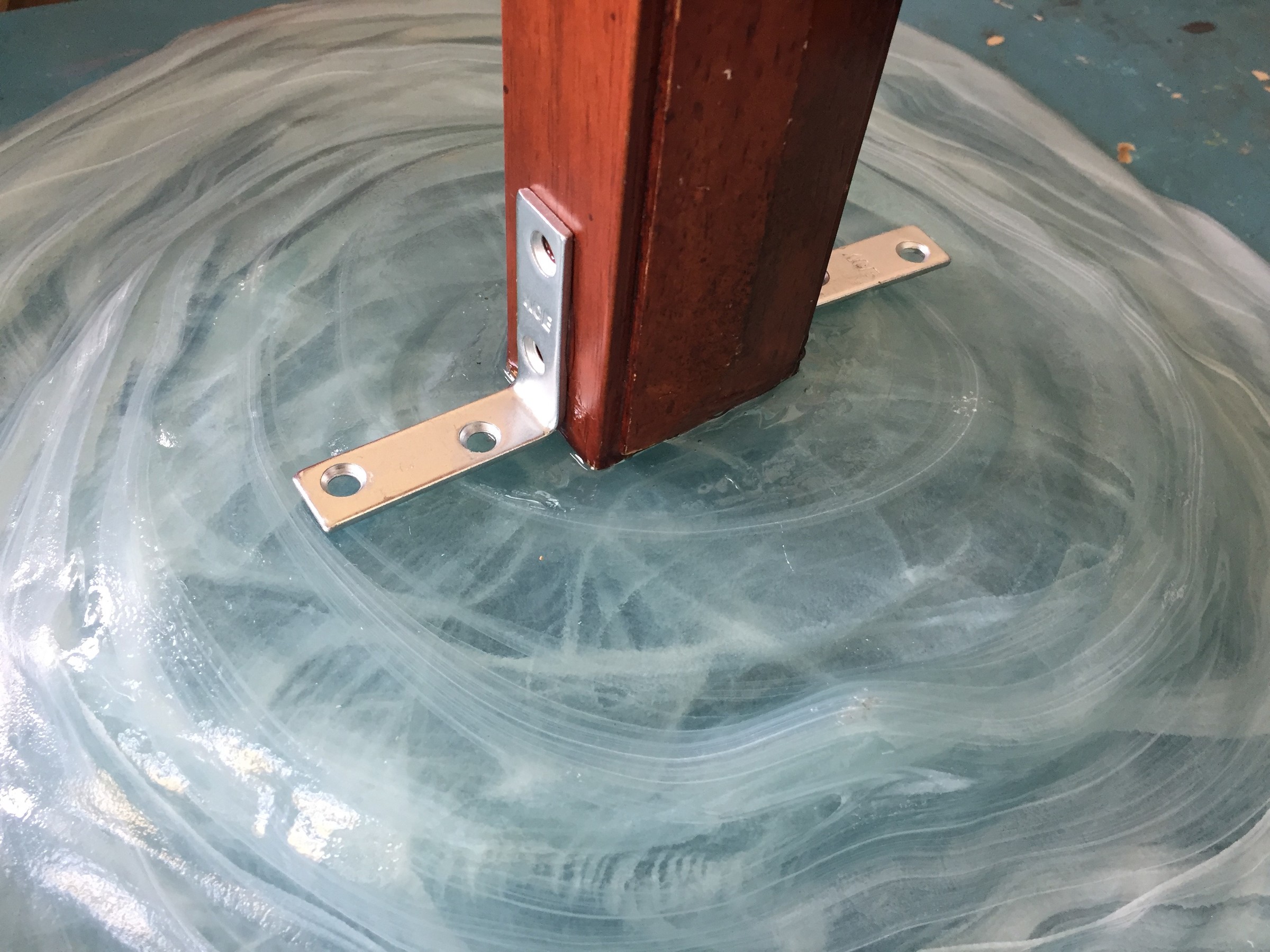 Tim glues the chair leg to the platter and adds l-brackets for additional support