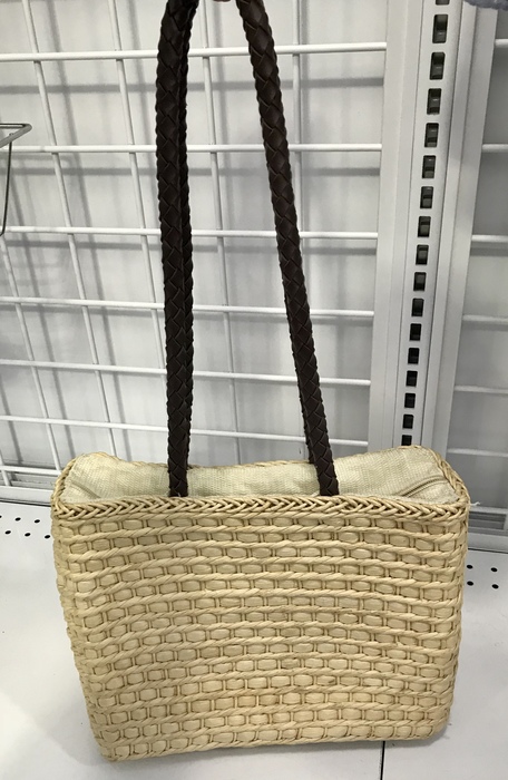 Straw bag with dark shoulder strap found at Goodwill in Bowie