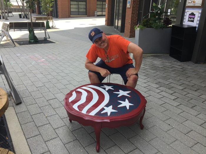 Tim poses with completed upcycled American Flag accent table