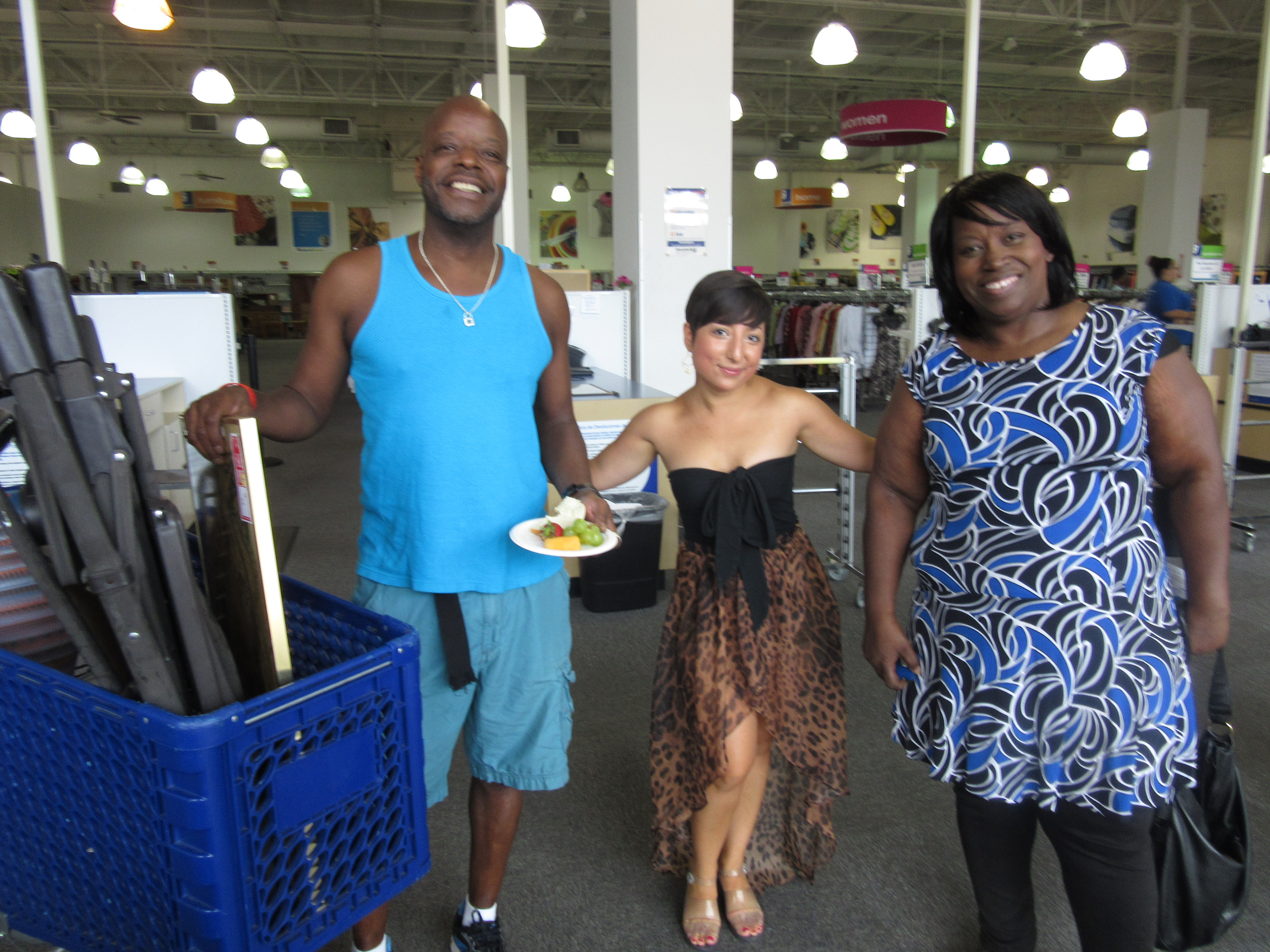 Carolyn poses for a photo with two meetup shoppers at the Bowie, MD Goodwill