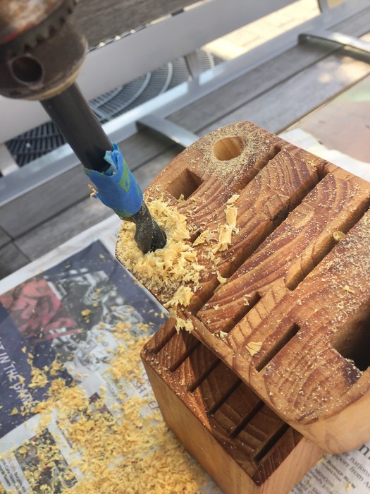 Tim drills holes into knife block