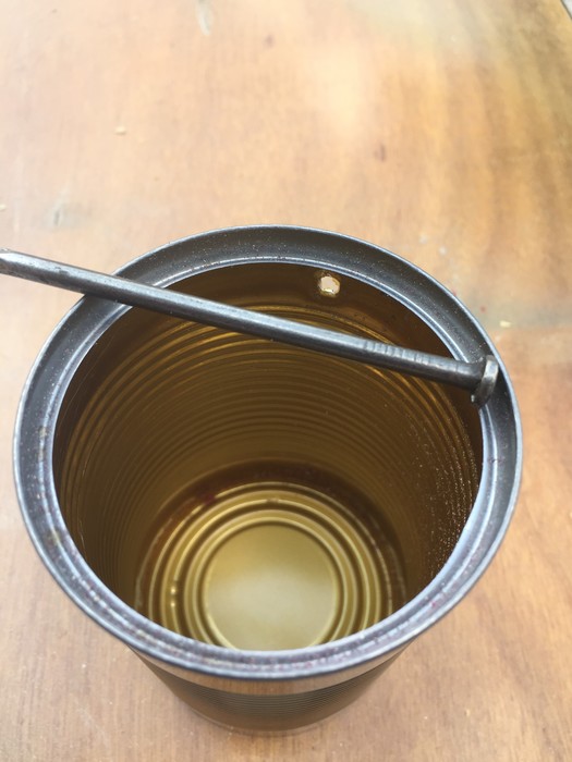 Tim's can with a drilled hole