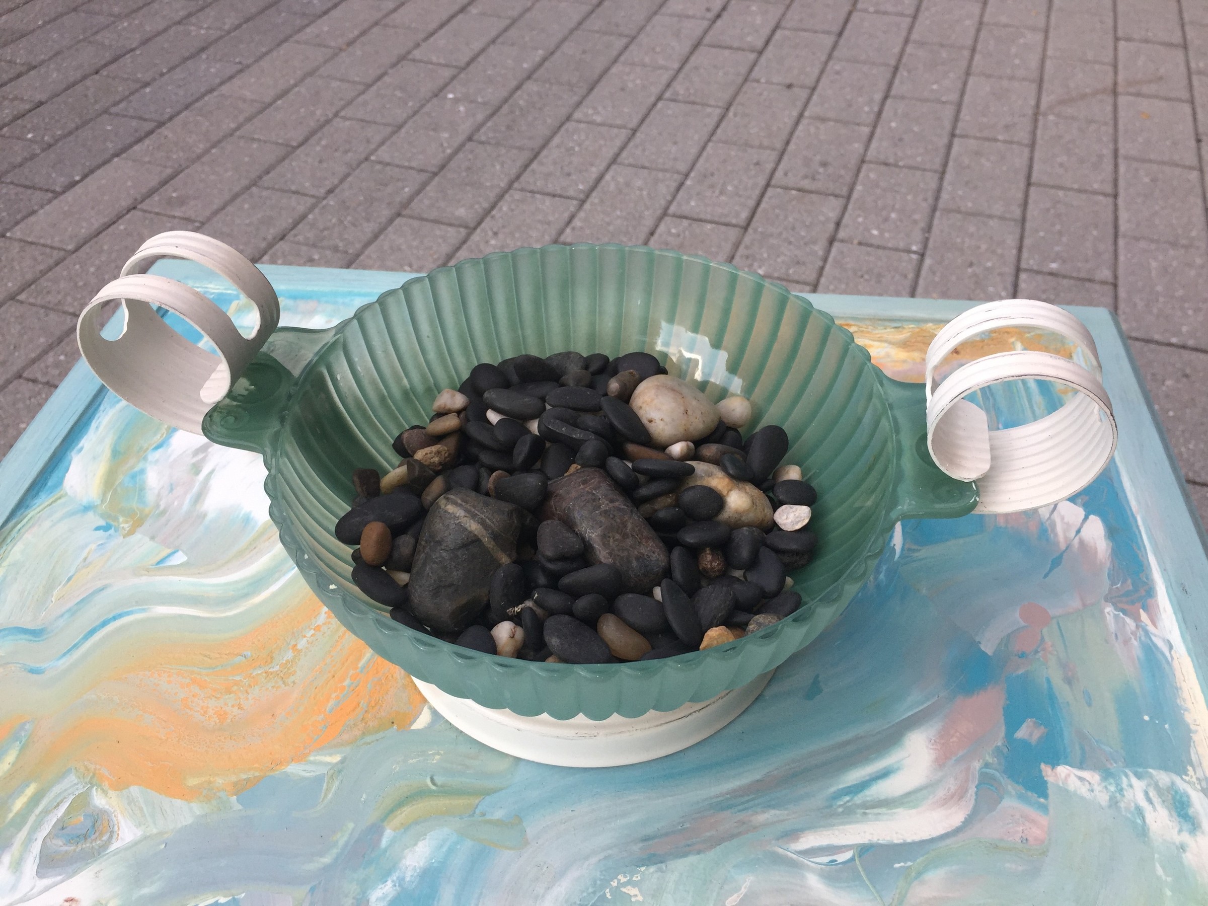 Tim's "beachy" photo frame tray and painted sea glass bowl filled with pebbles.