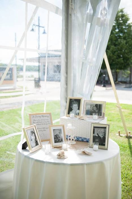 Karen's memory table displayed at her wedding sourced with Goodwill picture frames