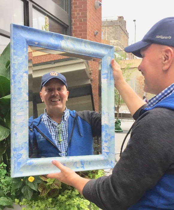 Tim Kime's reflection in an upcycled mirror