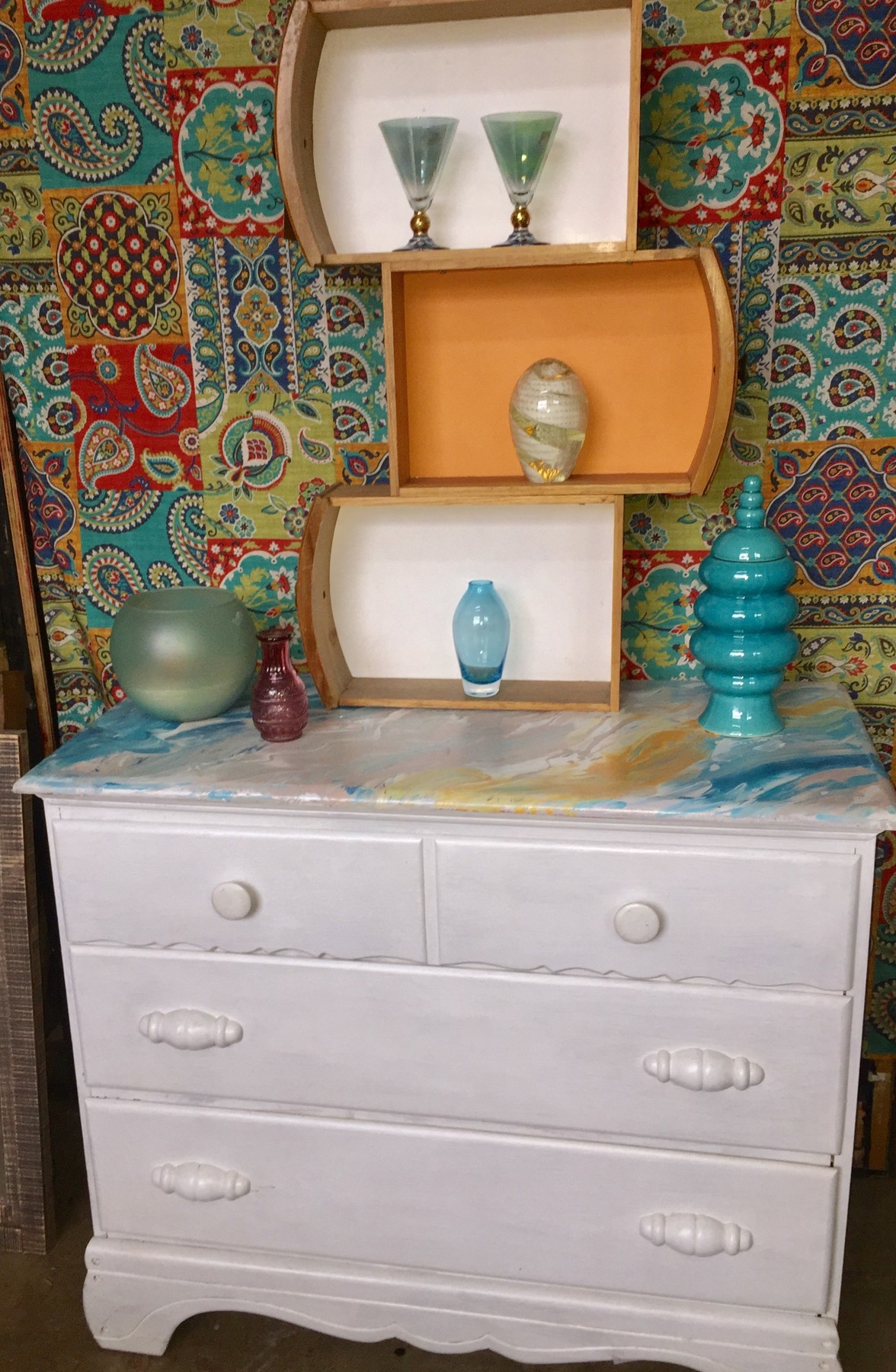 Tim's painted dresser adorned with stylish accessories