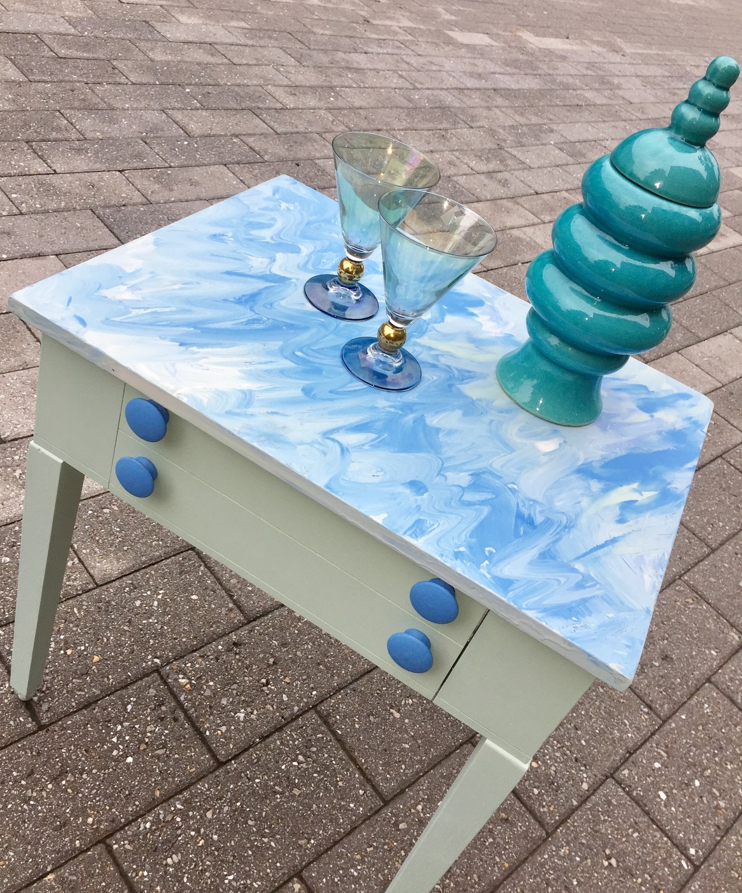 Tim's painted side table adorned with complementary accessories 