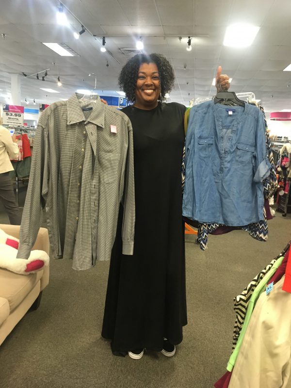 Meetup shopper flaunts shirt finds at Richmond Highway Goodwill