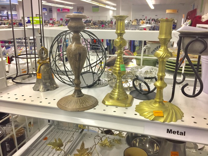 fancy candelabras in the metal housewares section of Goodwill