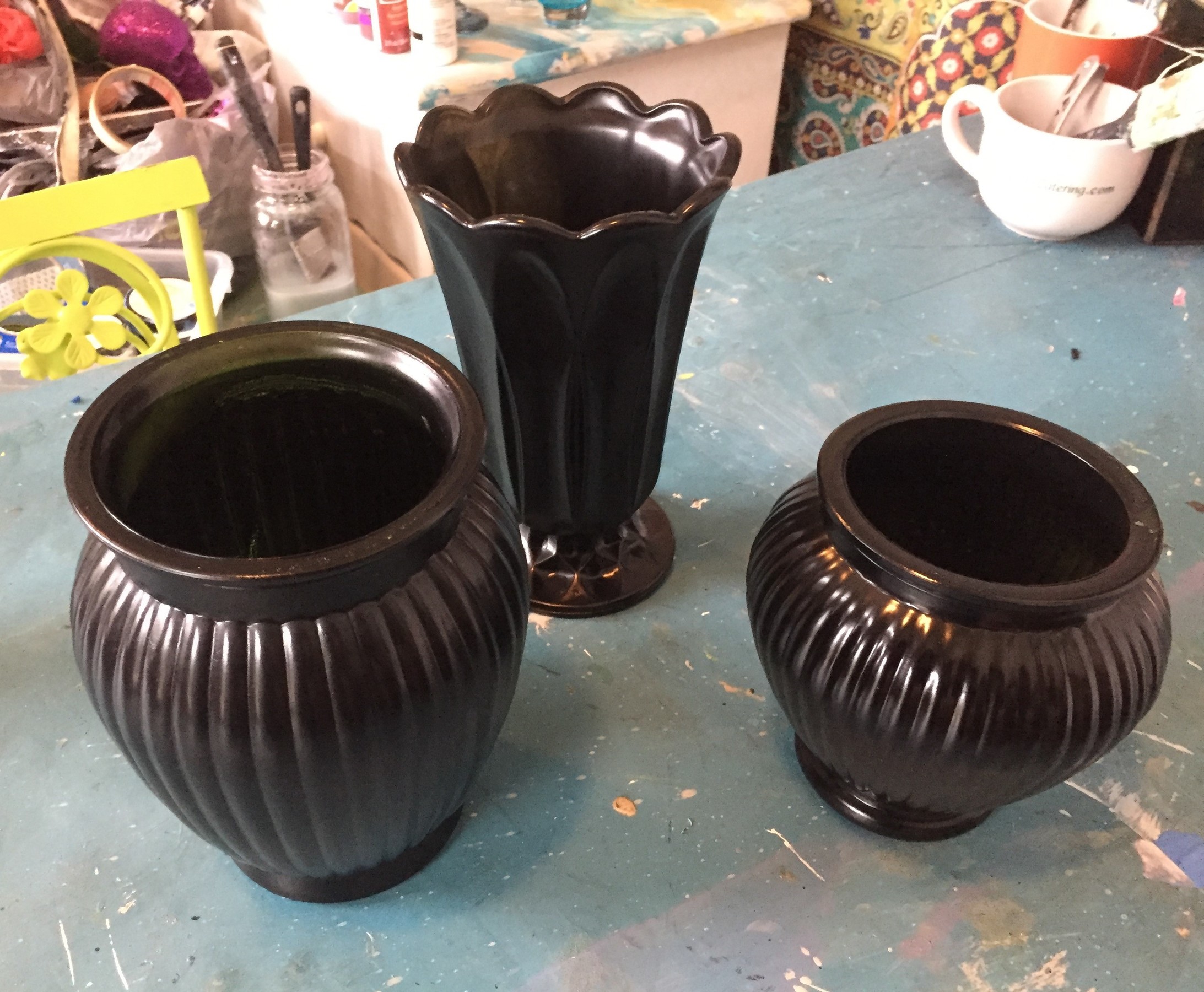 Tim's glass vases, spray-painted black.