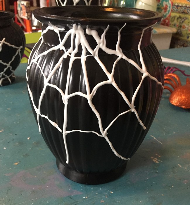 Tim's wide brimmed vase painted with puffy paint web