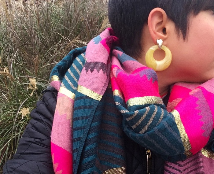 Carolyn's bright earrings from Goodwill