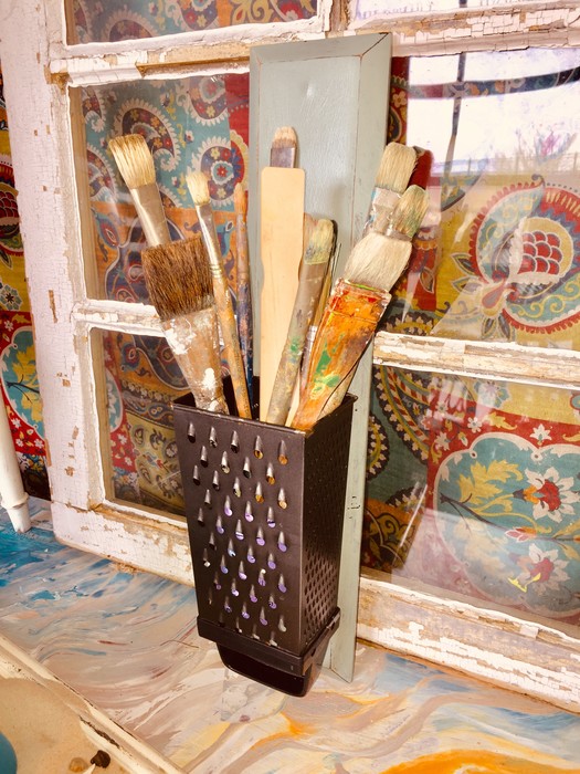 Tim's completed grater used to hold paint brushes