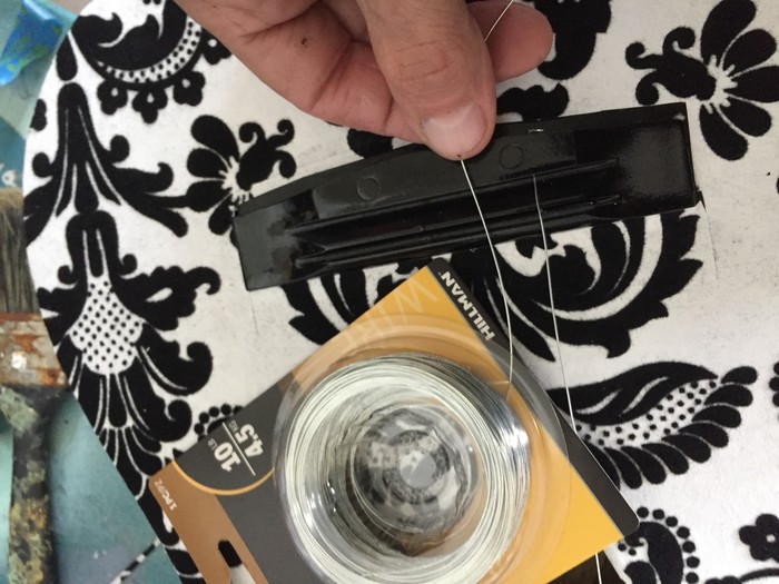 Tim adds wires to the front of the guitar