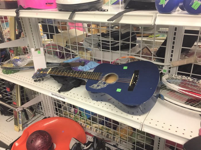 Tim's guitar found at Goodwill retail store