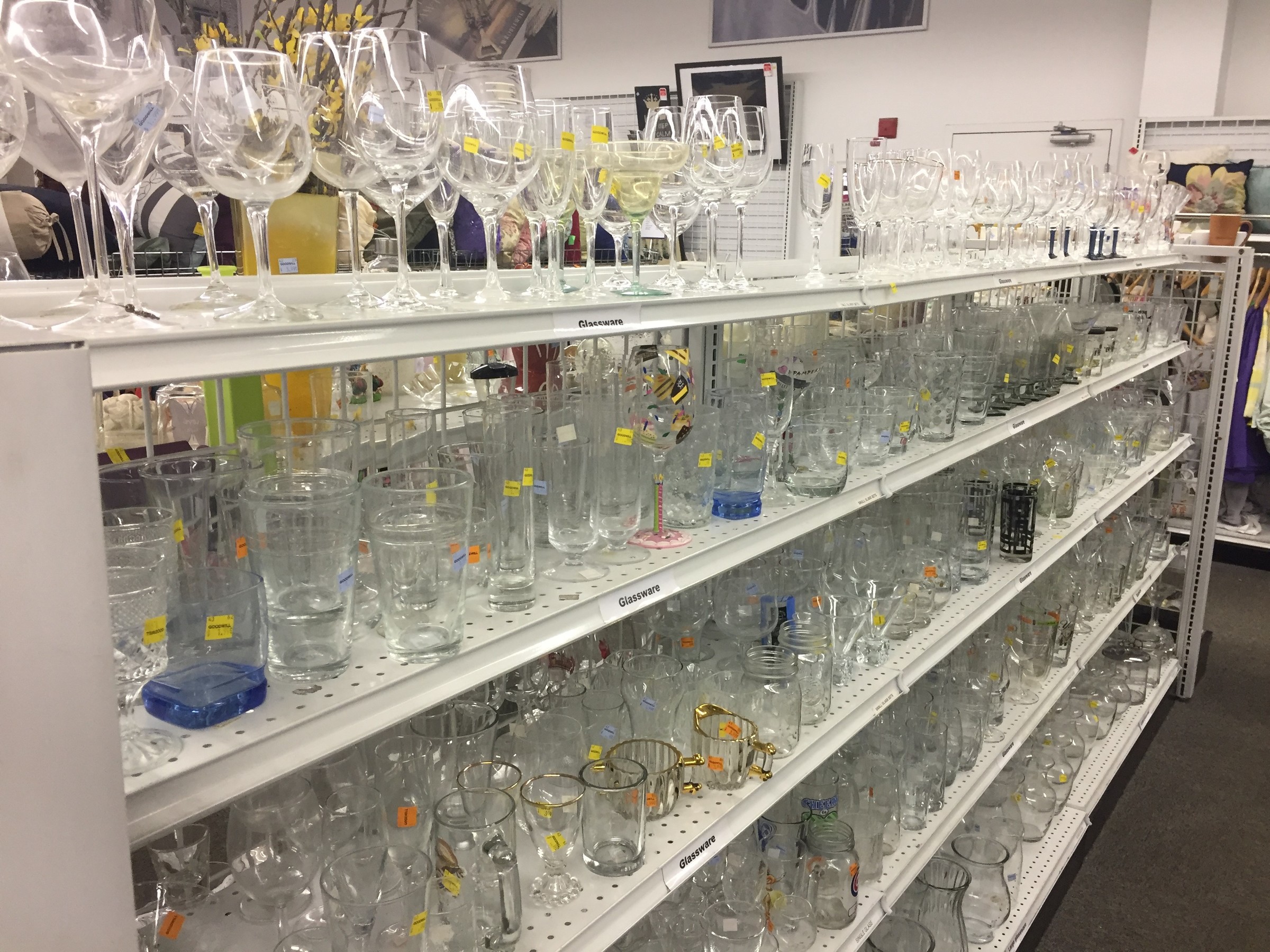 wine glass section at Goodwill store