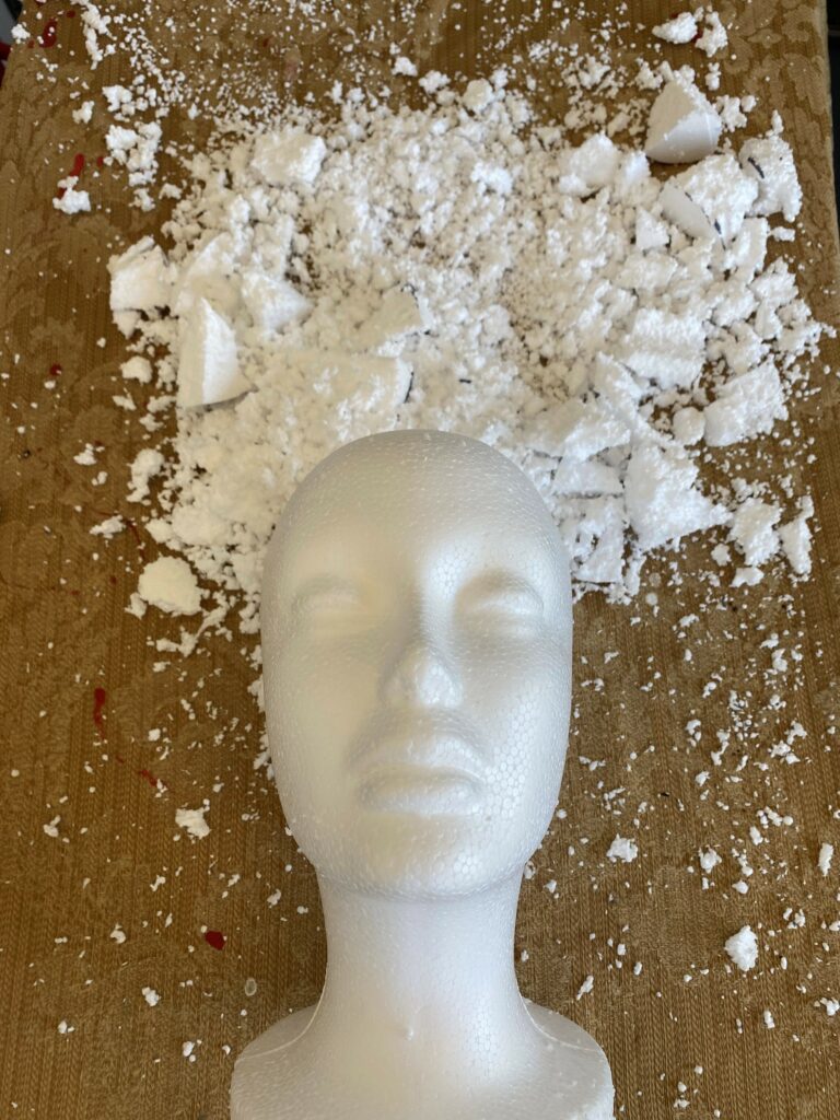 Make a “Concrete” planter with styrofoam mannequin heads 